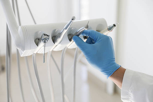 Professional Tooth Extraction technician working in Rushville, IN